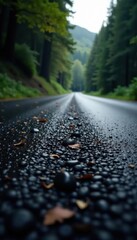 Deep black asphalt, subtle shine, fine-grained, outdoor, road surface