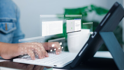 Person using tablet with keyboard and virtual screens of data, calendar, and files symbolizing...