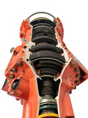 A cutaway view of Allison transmission, revealing its complex internal gears, clutches, and mechanical components. Isolated on white background.