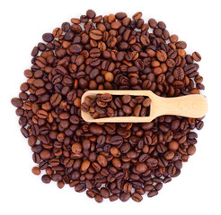 Roasted coffee beans with wooden scoop