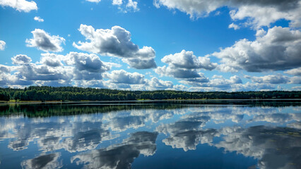 White and pastel light reflections on water.