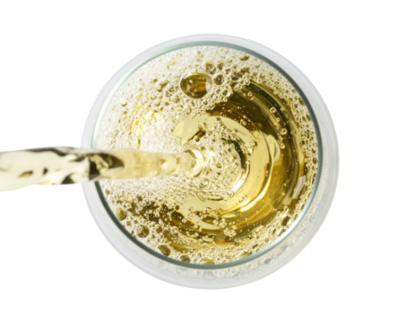 A top-down view of a sparkling drink in a glass, showcasing bubbles and a swirling liquid.