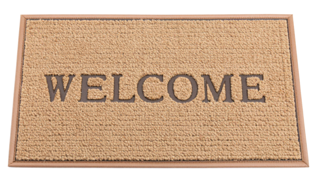 A welcome mat featuring the word "WELCOME" prominently displayed in a textured design.