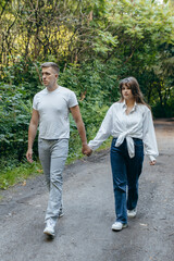 Obraz premium Young couple relax at nature at summer 