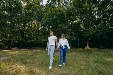 Fototapeta premium Young couple relax at nature at summer 