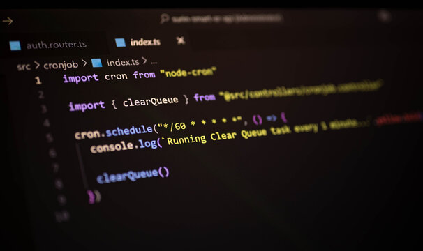 Close-up of TypeScript code using node-cron to automate task scheduling in a backend project. Ideal for DevOps, background job automation, and server-side task runners.