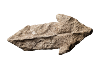 Ancient stone arrowhead isolated on black background