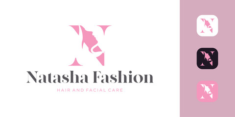 Elegant vector logo design featuring the letter N combined with the silhouette of a woman's head. The stylish and feminine concept is ideal for beauty, cosmetics, fashion, health