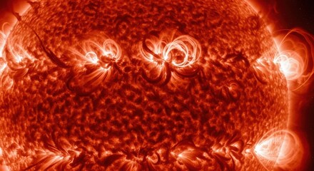 Close up of the sun showing solar flares and plasma activity with magnetic fields in the atmosphere of the star