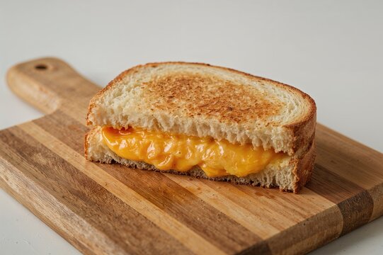 Toasted cheddar cheese sandwiches on white bread - Powered by Adobe