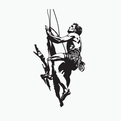 silhouette of a rock climbing