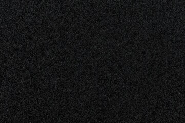 Abstract background with black plastic texture