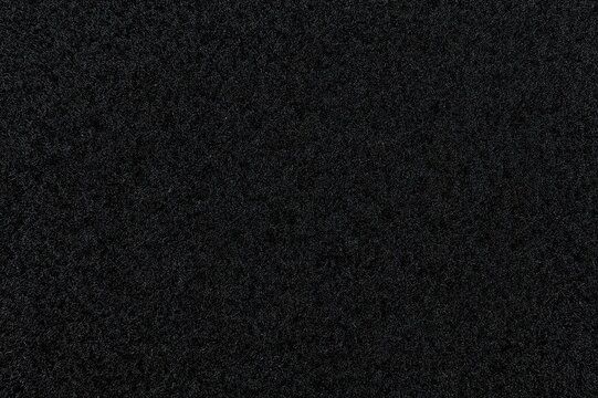 Abstract background with black plastic texture