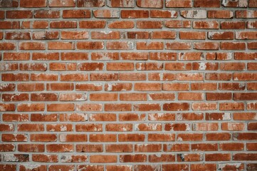 Obraz premium Horizontal arrangement of cracked cement and red brick background