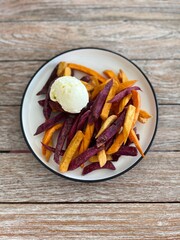 Sweet Potato Fries with Vanilla Ice Cream on Rustic Wooden Table