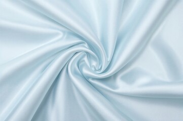 Fototapeta premium Silky satin cloth in shades of light blue, silver, and white with elegant folds and drapes. Soft pastel hues creating a fresh and pure look. Ideal for festive and clean design templates. Flat lay