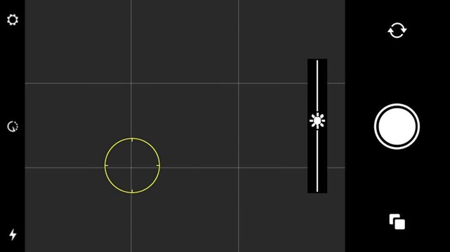 The mobile camera shutter in black background.