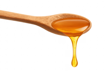 Honey dripping from wooden spoon on transparent background