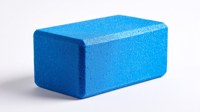 White background yoga foam block on.

