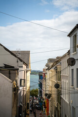 Colorful houses and scenic harbor views in Cobh