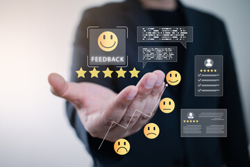 Customer feedback and satisfaction rating concept with virtual smiley icons, star reviews, and user evaluations representing service quality improvement and business reputation management.
