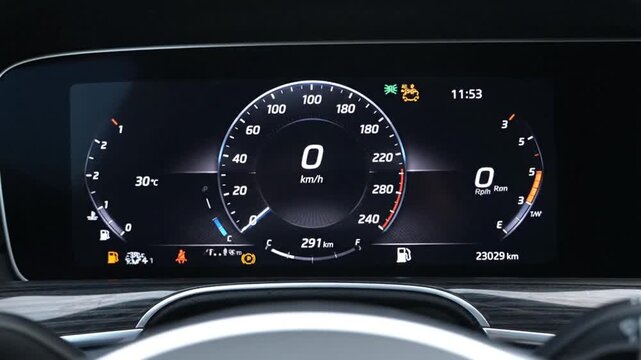Car Dashboard Close Up View Displaying Speedometer and Warning Lights Indicators