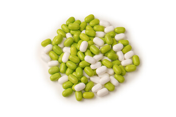 Sweet multicolored candies isolated on white background.