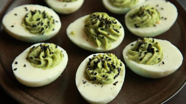 rotten-style green devil eggs served as spooky Halloween party finger food