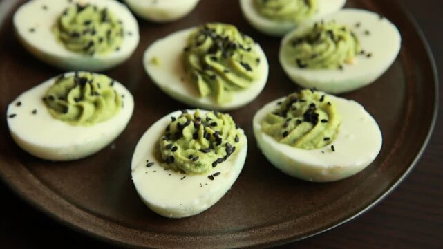 rotten-style green devil eggs served as spooky Halloween party finger food