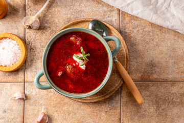 Traditional Ukrainian beet soup - borscht on the table top view
