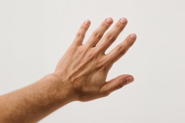 A male hand extending outward, indicating an act of grasping or helping, set against a plain white backdrop.