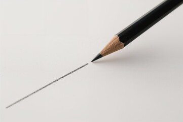 A sheet of paper features an underline and a period drawn with a graphite pencil, leaving room for text.