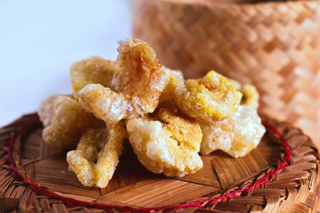 Crispy pork skin on woven bamboo, Crispy pork skin