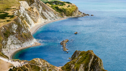 Aerial drone view of the stunning Man O' War Cove on the Jurassic Coast, Dorset, England