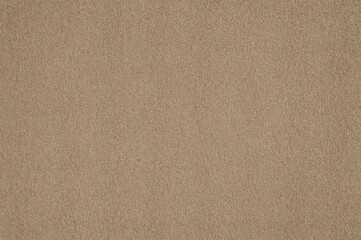 Fototapeta premium Detailed close-up of aged textured burlap fabric, rustic backdrop in neutral tones of tan, brown, and grey. Macro canvas design. Linen texture under natural lighting.