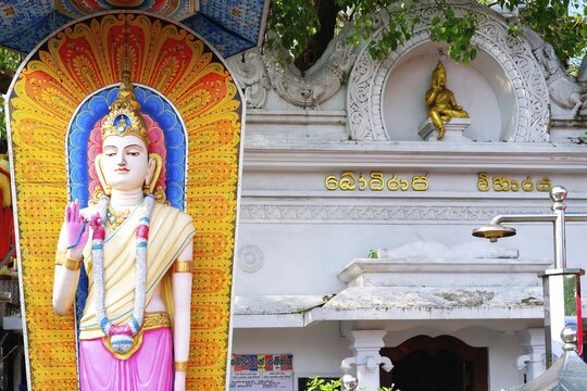 Buddha statue at the entrance of a temple, Colombo, Sri Lanka