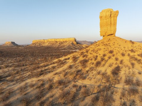 The Vingerklip (rock finger) and the Ugab Valley Terraces are surrounded by thornbush and mopane (Colophospermum mopane) savanna. Aerial view. Drone shot. Damaraland, Namibia