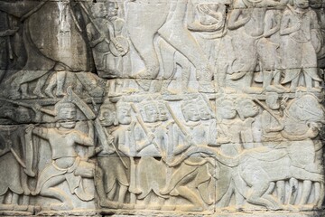 Stone bas-reliefs, Khmer war campaign against the Cham, relief wall, east façade, Bayon temple, Angkor Thom, Siem Reap province, Cambodia