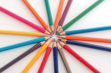 Fototapeta premium Colored pencils on a plain white surface. Studio shot.