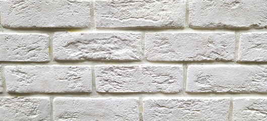 Texture of white brick wall featuring weathered appearance and unique patterns suitable for interior or exterior decor ideas throughout any space