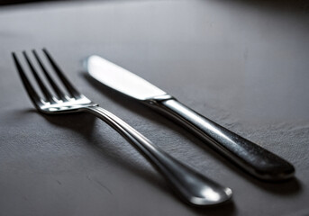 Elegant Silver Cutlery Set on a Textured Surface
