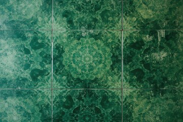Close-up of a green tile showcasing an abstract textured pattern for wallpaper