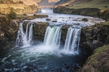 Scenic Waterfall and Weir Amidst Lush Landscape