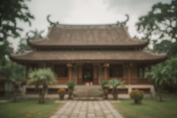 Obraz premium Out-of-focus backdrop featuring a traditional house with distinctive architecture.