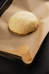 Dough raw cooking yeast, flour, water tasty snack fresh delicious gourmet food background on the table rustic food top view copy space