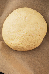 Dough raw cooking yeast, flour, water tasty snack fresh delicious gourmet food background on the table rustic food top view copy space