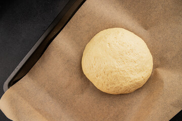 Dough raw cooking yeast, flour, water tasty snack fresh delicious gourmet food background on the table rustic food top view copy space