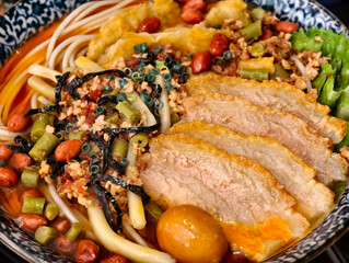 Chinese luosifen noodle soup with fried pork