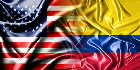 The national flags of the United States and Colombia are combined into one and placed side by side on a fluttering cotton background. Flags.