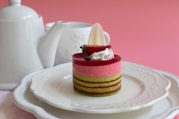 Dessert Concept , Strawberry cake on Pink Background